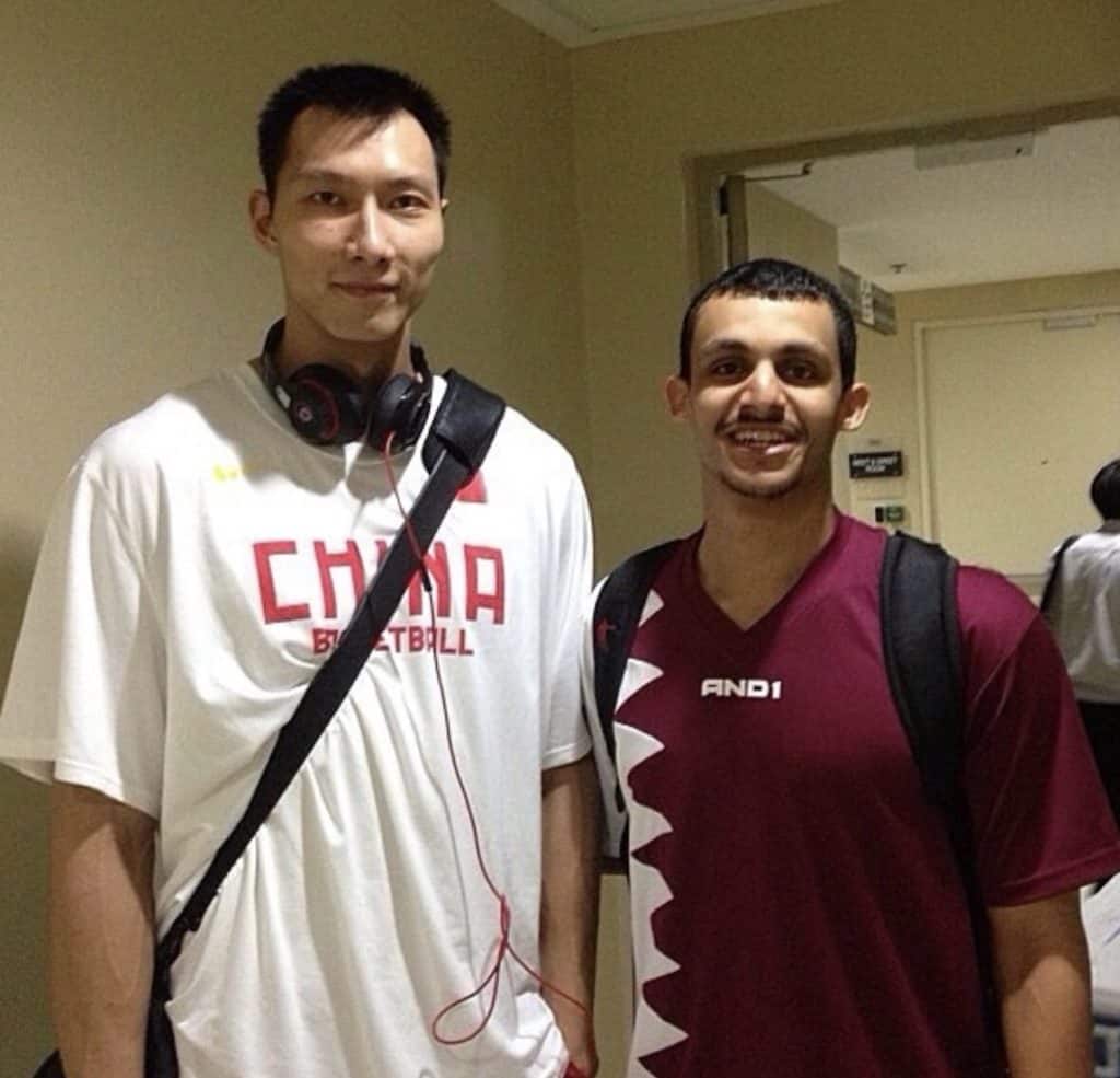 [Mizo Amin with Chinese X-NBA Player Yi Jianlian after the game]